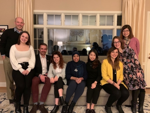 Dr. Jeff Gingerich (provost), Clara Fabbri (France), Lukas Rackow (Germany), Alessandra Abate (Italy), Khadiga AboBakr (Egypt), Hsiang-Ling Wang (Taiwan), Sarah Romero Avella (Colombia), Dr. Yamile Silva (dept. chair), and Dr. Ann Pang-White (Asian Studies) sitting on a couch..